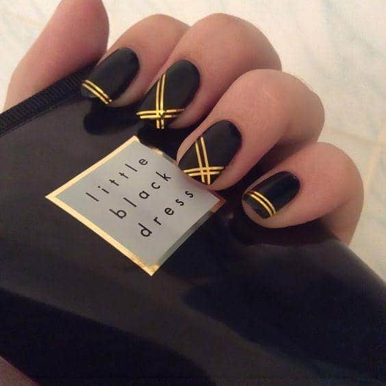 black and gold manicure