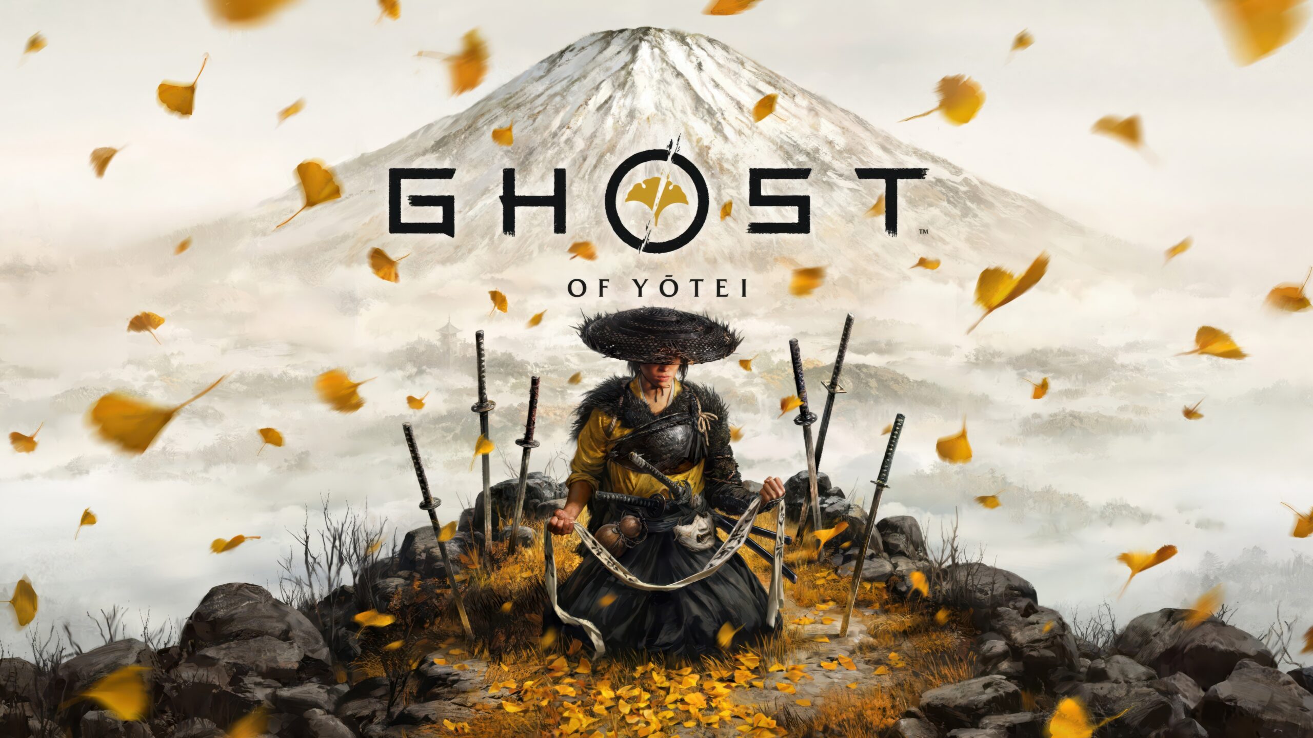 Ghost of Yotei Homescreen. Η πρωταγωνίστρια στέκεται γονατισμένη στην άκρη ενός γκρεμού με πεσμένα φθινοπωρινά φύλλα. Πίσω της αχνοφαίνεται ένα βουνό